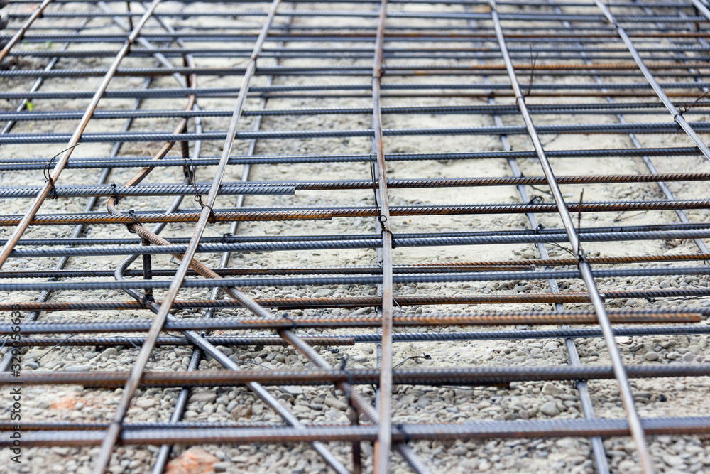 Background of reinforcing steel bars for building armature. Steel reinforcement in the construction of the building