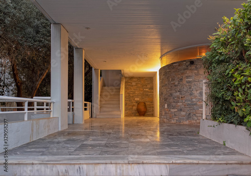 central perpective of elegant house entrance night view, Athens Greece photo