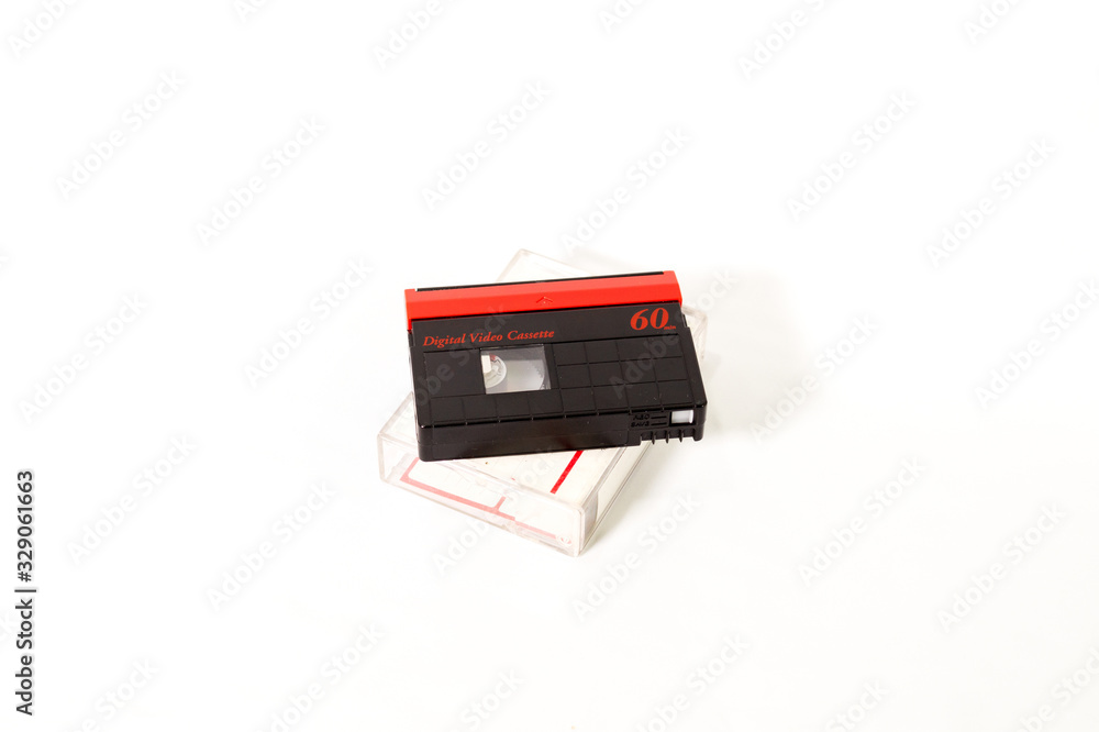 Digital video cassette for video graphy for backdated video camera isolated on white background