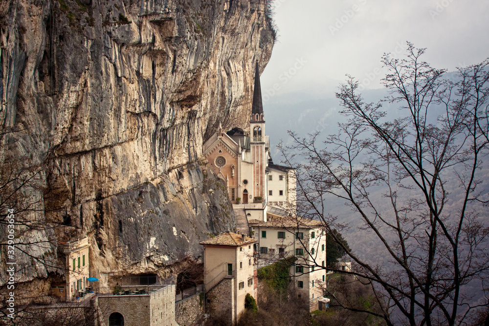Monastery on a rock with a high church spire