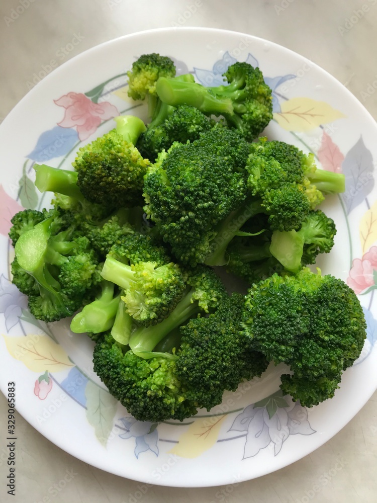 broccoli on white plate