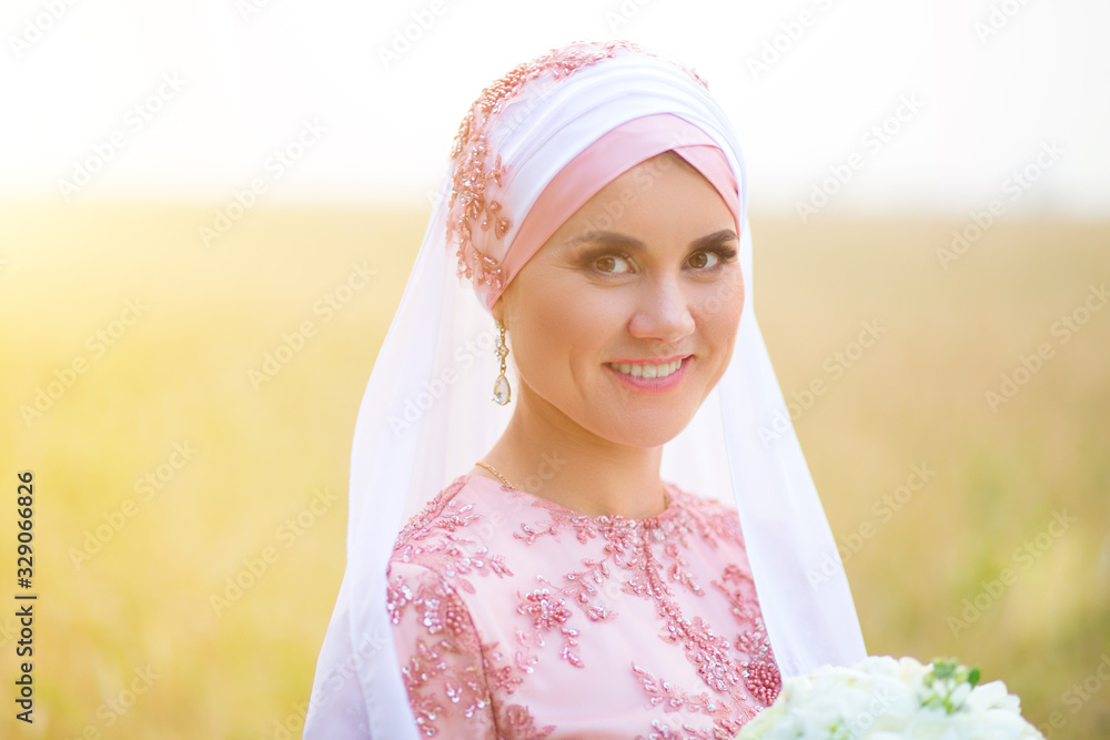 Beautiful female model in traditional bridal costume. Muslim marriage Beautiful female model in traditional bridal costume. Muslim marriage