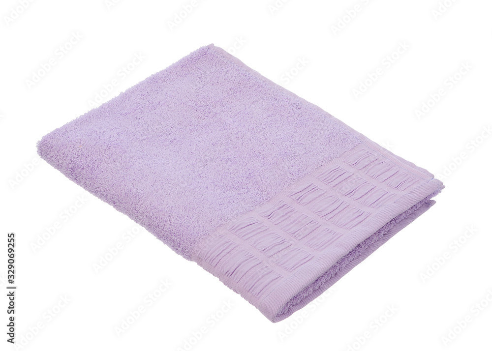 lilac towel lies on a white background of isolate lilac towel lies on a white background of isolate