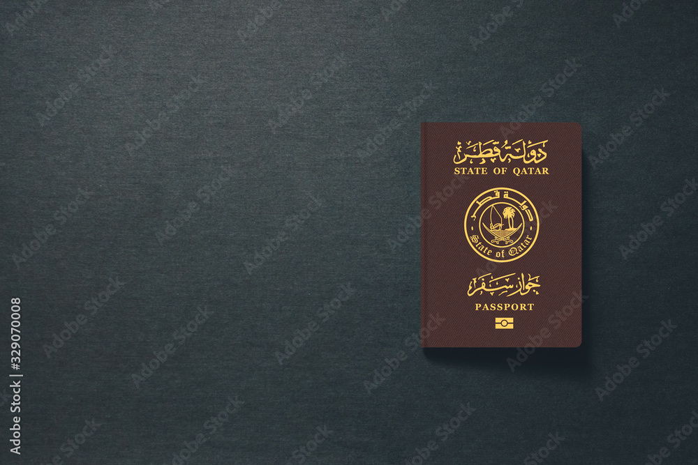 Qatar Passport on dark background with copy space - 3D Illustration Qatar Passport on dark background with copy space - 3D Illustration