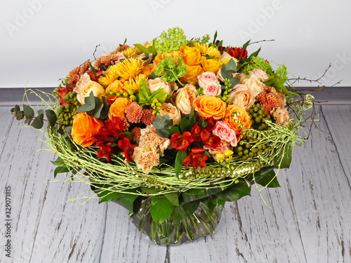 Flower arrangement with roses, chrysanthemum santini and alstroemeria photo