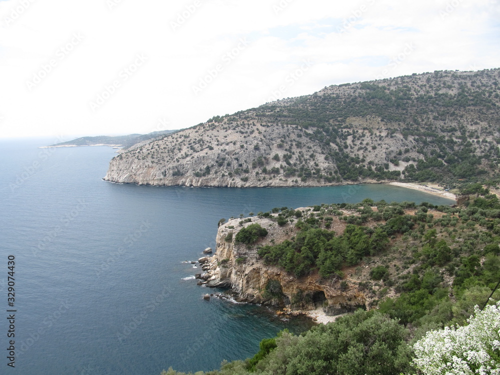 Wild beach on Thassos. beautiful landscape with views of Sora and the rocky coast