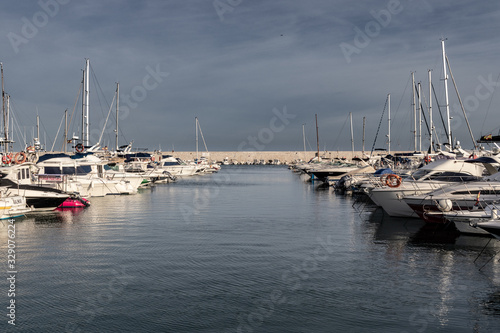 Fishing boat near the pier after the sea