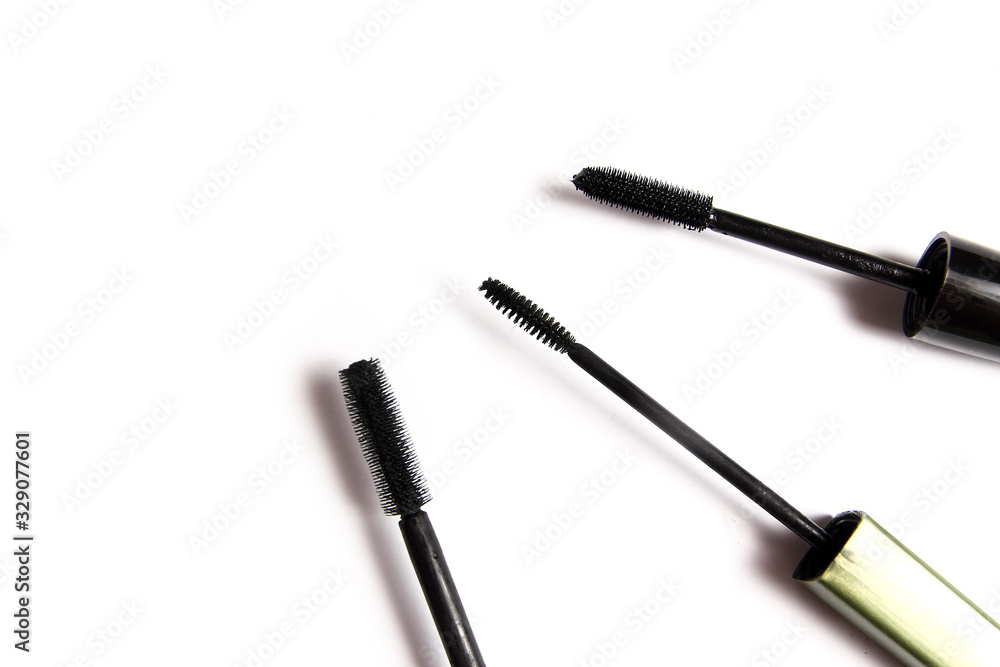 different female cosmetics on a white background different female cosmetics on a white background