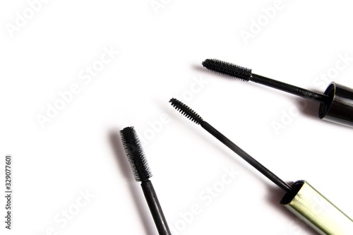 different female cosmetics on a white background