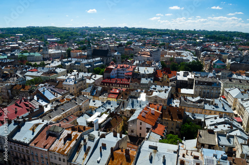 Panorama of the city of Lviv. Medieval city with red tiled roofs. A city for romantic people and lovers. Cozy Europe. Lviv, Western Ukraine, July 18, 2017 © Artem