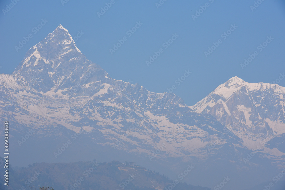 The Machapuchare and Annapurna range seen from Phewa lake in Pokhara, Nepal