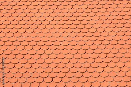 Roof with bright red tiles © Gudellaphoto