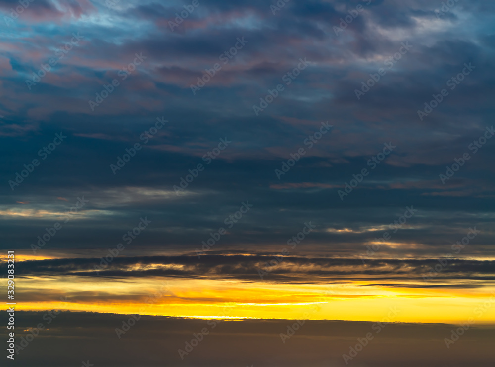 Fototapeta premium Fantastic dark thunderclouds at sunrise