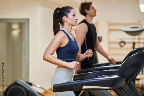 Fit couple at the gym looking very attractive
