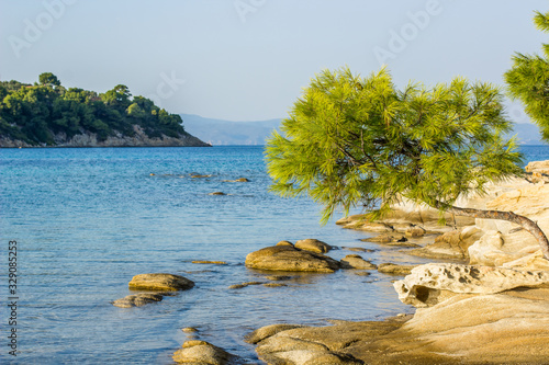tropic Mediterranean landscape sea lagoon scenic view rocky beach coast line and south vivid green tree