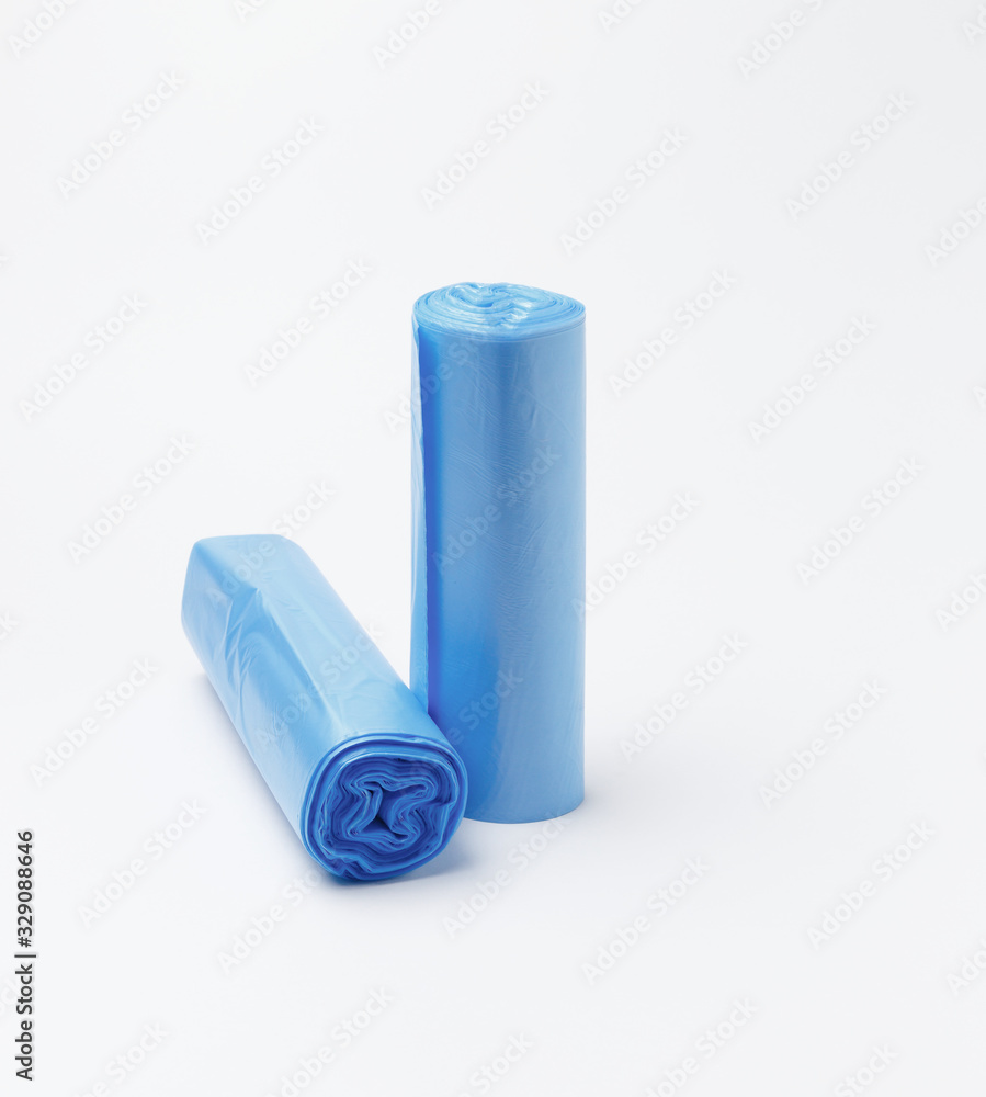 Disposable plastic bags for household garbage or waste on a white background Disposable plastic bags for household garbage or waste on a white background
