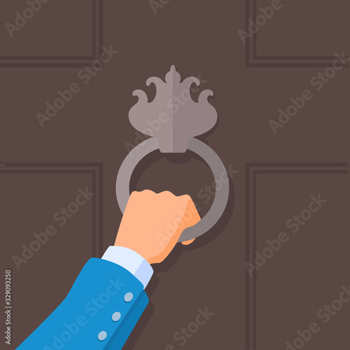 A hand holding a classic elegant door knocker. Guest knocking in a front door. Vector cartoon illustration.