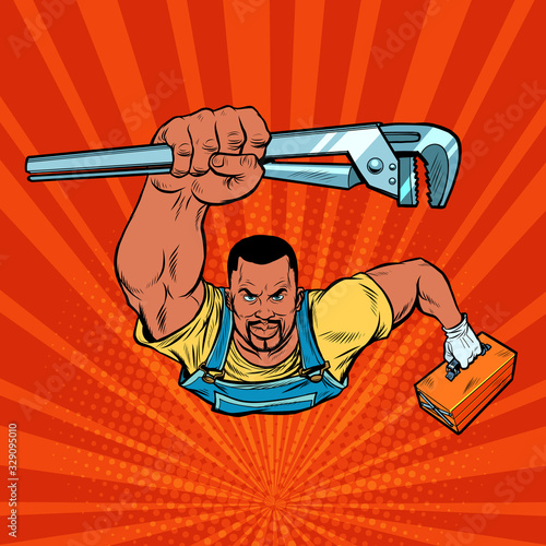African repairman with an adjustable wrench