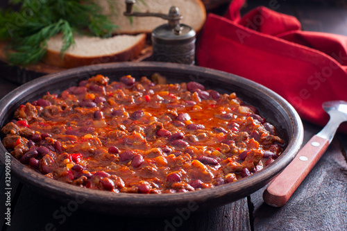 Chili con carne, traditional Mexican dish with beef and beans, selective focus