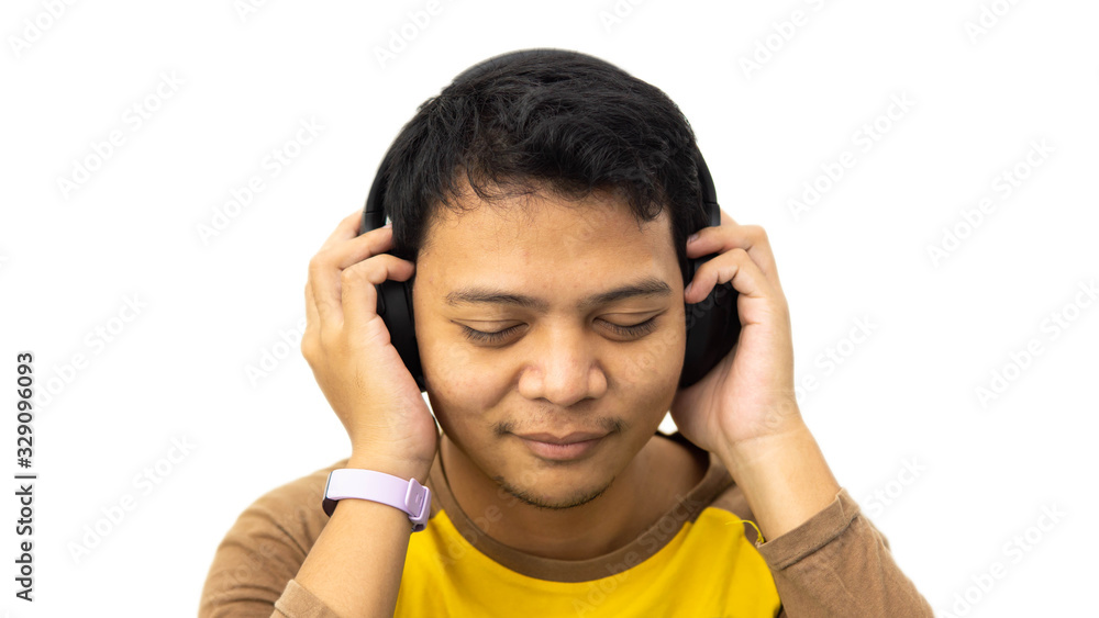Close-up portrait of happy Asian man smiling while deep feeling listen to music on white isolated background. Close-up portrait of happy Asian man smiling while deep feeling listen to music on white isolated background.