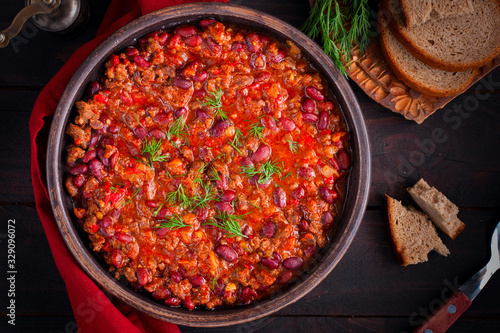 Chili con carne, traditional Mexican dish with beef and beans, top view