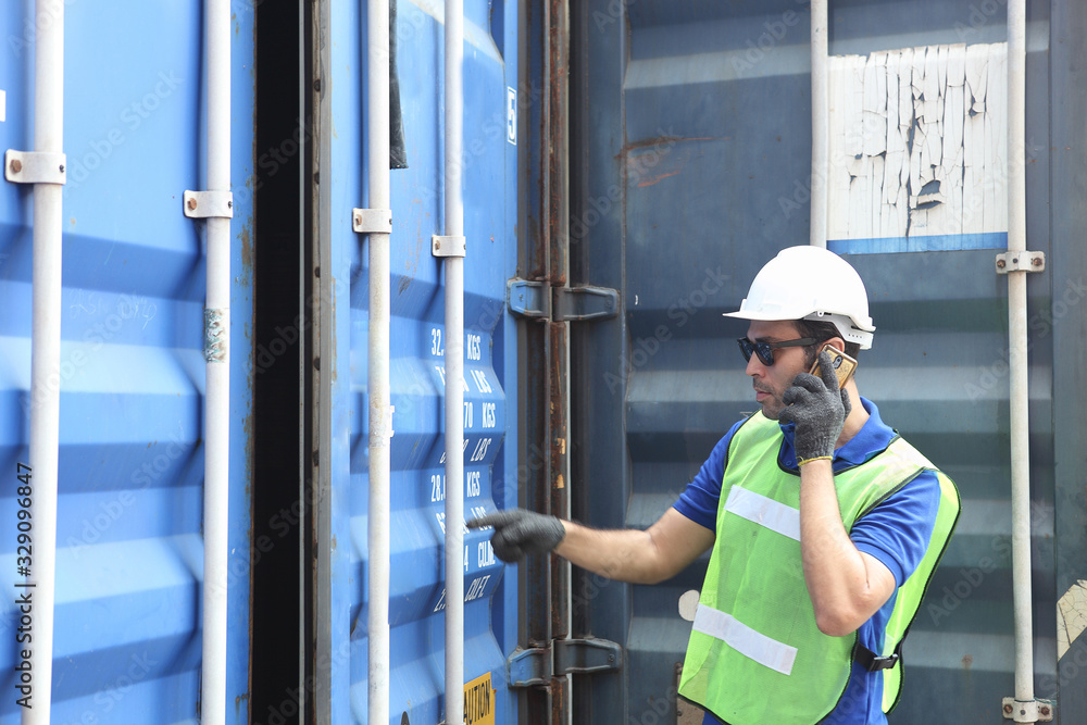 Engineer on site, he is working control logistics or import export industry Engineer on site, he is working control logistics or import export industry