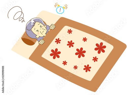 A woman sleeping on a futon