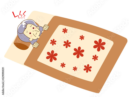 A woman sleeping on a futon