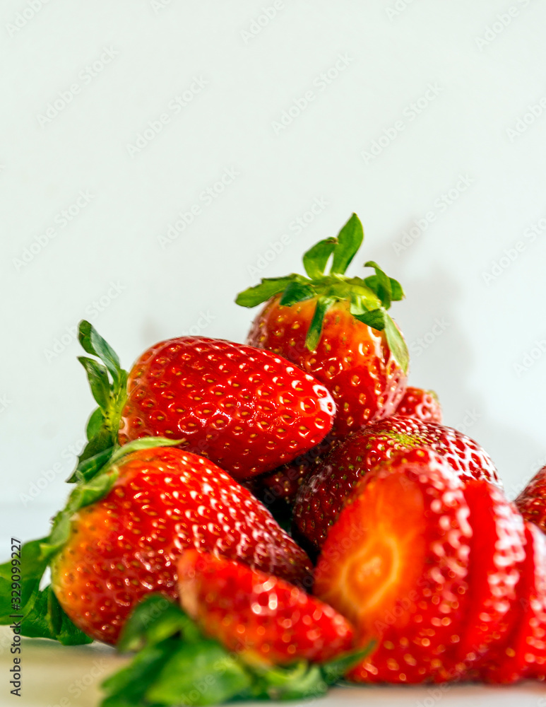 Several strawberries surrounded by white background Several strawberries surrounded by white background