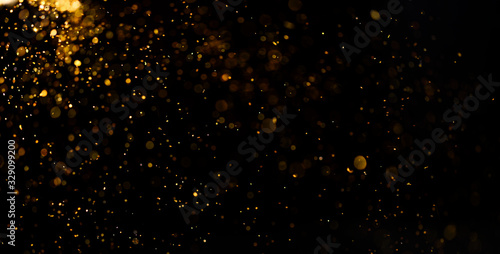 Abstract gold bokeh defocus by neon lights blur background..