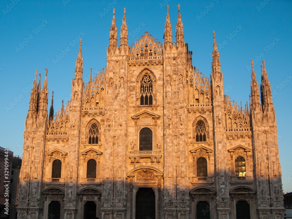 Duomo di Milano on background of blue sky at sunset, Milan, Lombardy, Italy