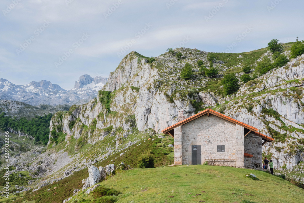 Cabin surrounded by mountains in the Picos de Europa Regional Park, Asturias, Spain Cabin surrounded by mountains in the Picos de Europa Regional Park, Asturias, Spain