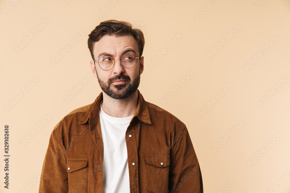 Portrait of a cheerful young arttractive bearded man Portrait of a cheerful young arttractive bearded man