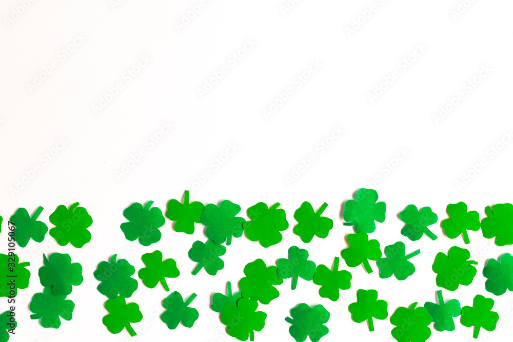 St.Patrick 's Day. Clover leaf background for design on white. St.Patrick 's Day. Clover leaf background for design on white.