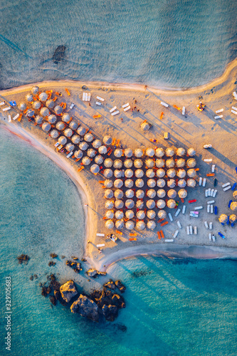 Aerial drone shot of beautiful turquoise beach with pink sand Elafonissi, Crete, Greece. Best beaches of Mediterranean, Elafonissi beach, Crete, Greece. Famous Elafonisi beach on Greece island, Crete. photo