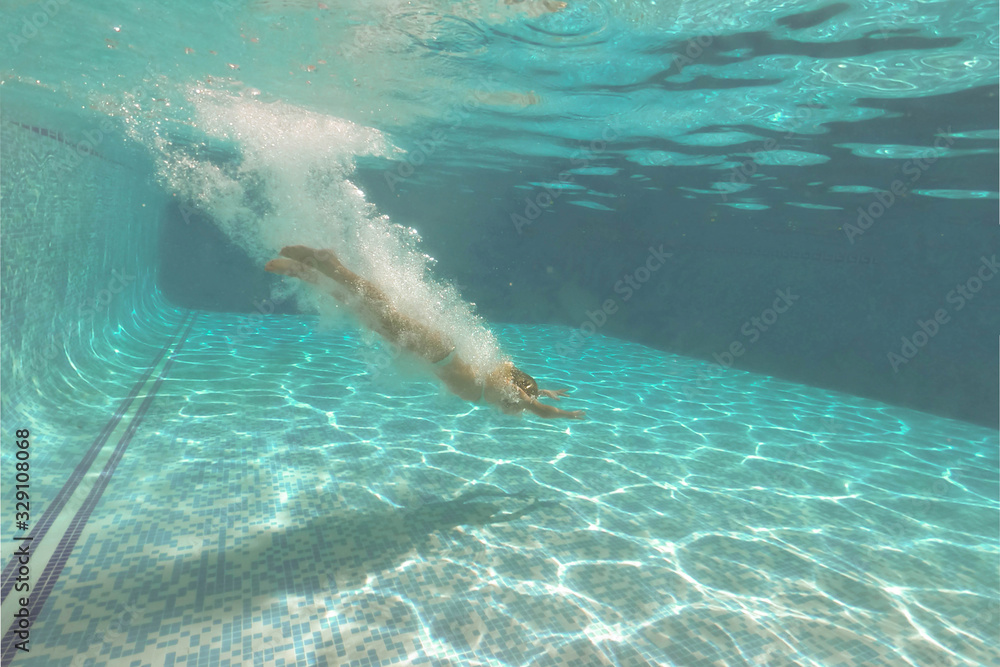 Fototapeta premium Pretty little girl in swimming pool , summer vacations.