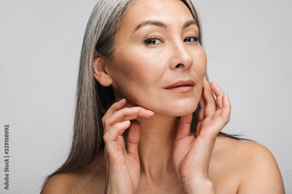 Beauty portrait of an attractive mature topless woman Beauty portrait of an attractive mature topless woman