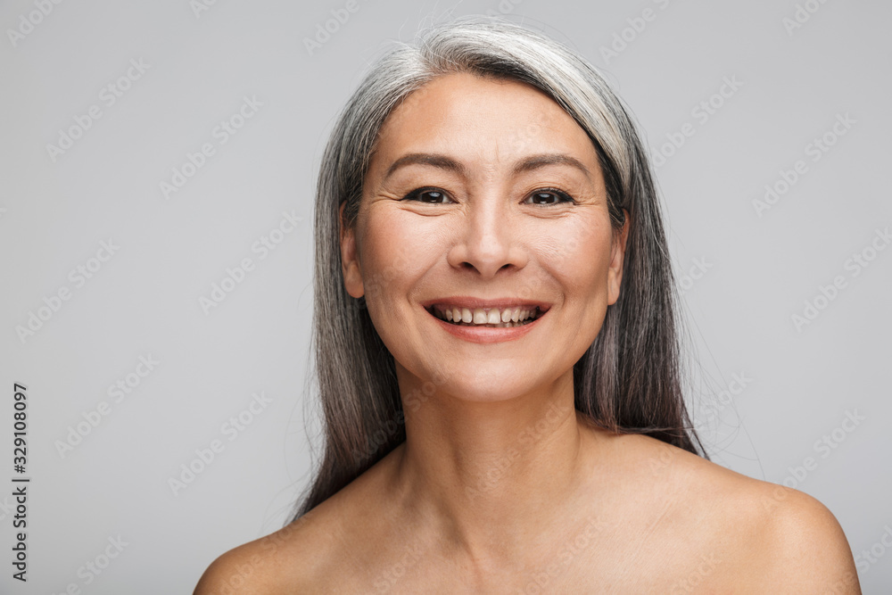 Beauty portrait of an attractive mature topless woman Beauty portrait of an attractive mature topless woman