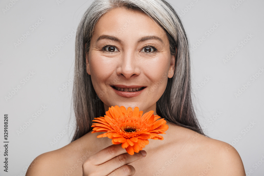 Beauty portrait of an attractive mature topless woman Beauty portrait of an attractive mature topless woman