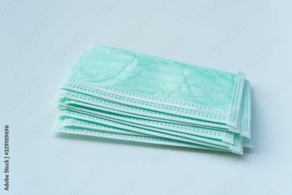 Close up of protective mask on white background. Health care concept. Close up of protective mask on white background. Health care concept.