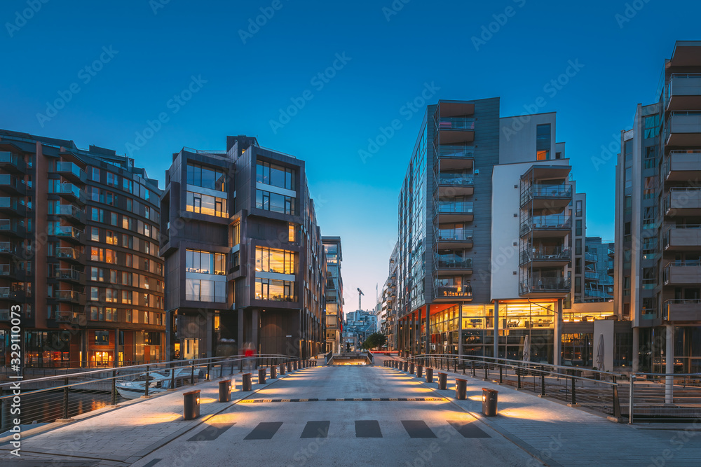 Oslo, Norway. Night View Of Residential Multi-storey Houses In Aker Brygge District. Summer Evening. Residential Area. Famous And Popular Place - obrazy, fototapety, plakaty 