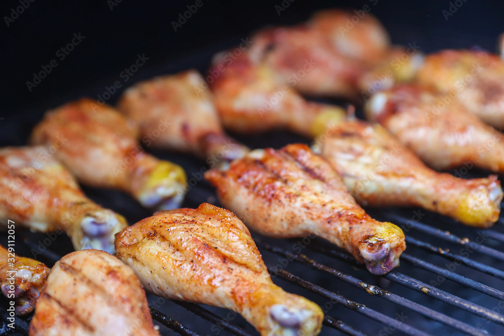 Chicken legs on grill