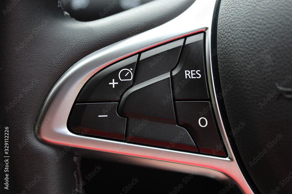 Car cruise control on steering wheel Stock Photo Adobe Stock