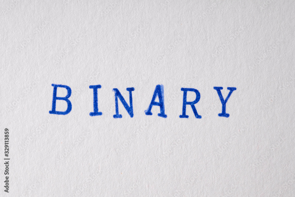 a binary word stamped on a piece of paper. a binary word stamped on a piece of paper.