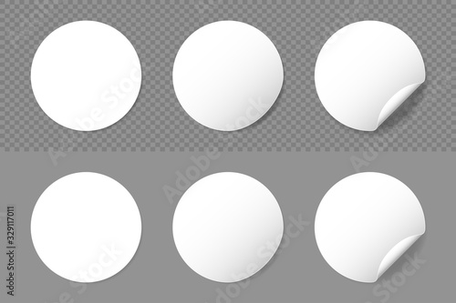 Rounded adhesive paper stickers set with shadow. Circle white tags with a folded edges. Blank templates of adhesive symbols  with peeling corner. Isolated on transparent background. Vector.