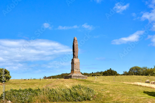 Stone obelisk by the Hammershus castle, Bornholm island, Denmark.