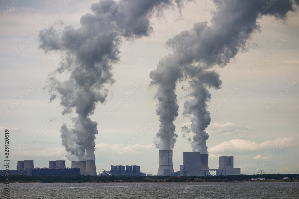 Multiple Coal Fossil Fuel Power Plant Smokestacks Emit Carbon Dioxide Pollution