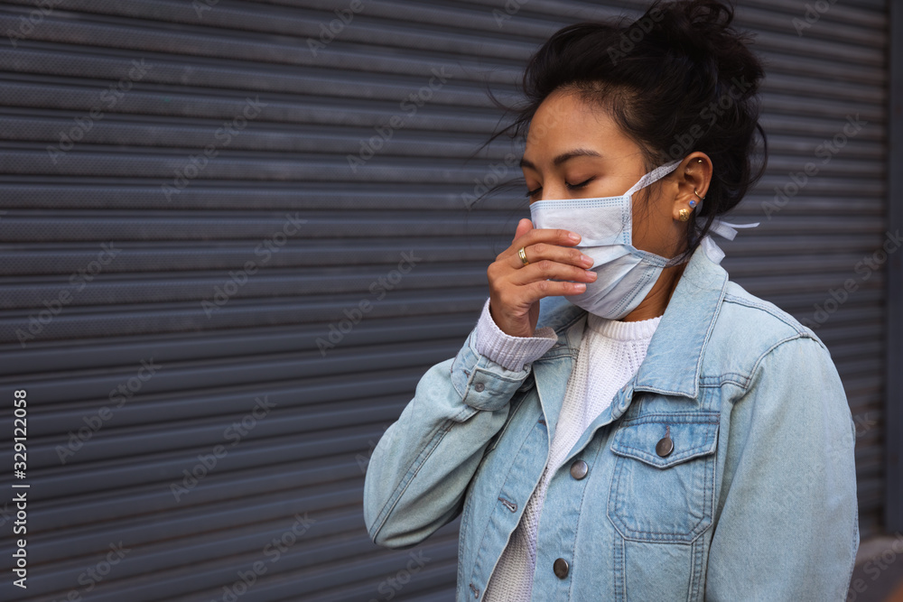 Woman wearing a Corona Virus face mask Woman wearing a Corona Virus face mask