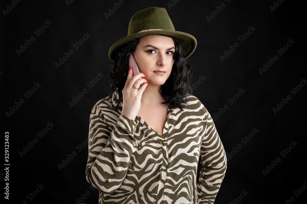 Attractive young woman dressed casually talking on cellphone, smartphone Attractive young woman dressed casually talking on cellphone, smartphone
