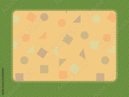 Naklejka Picnic mat on the grass. Yellow bedspread for sports, fitness on the nature. Pattern of geometric colorful shapes.
